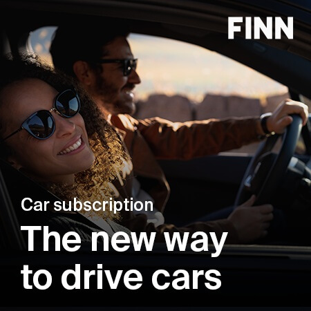 Finn USA discover car subscription in the usa - the image shows two people having fun in a car from finn